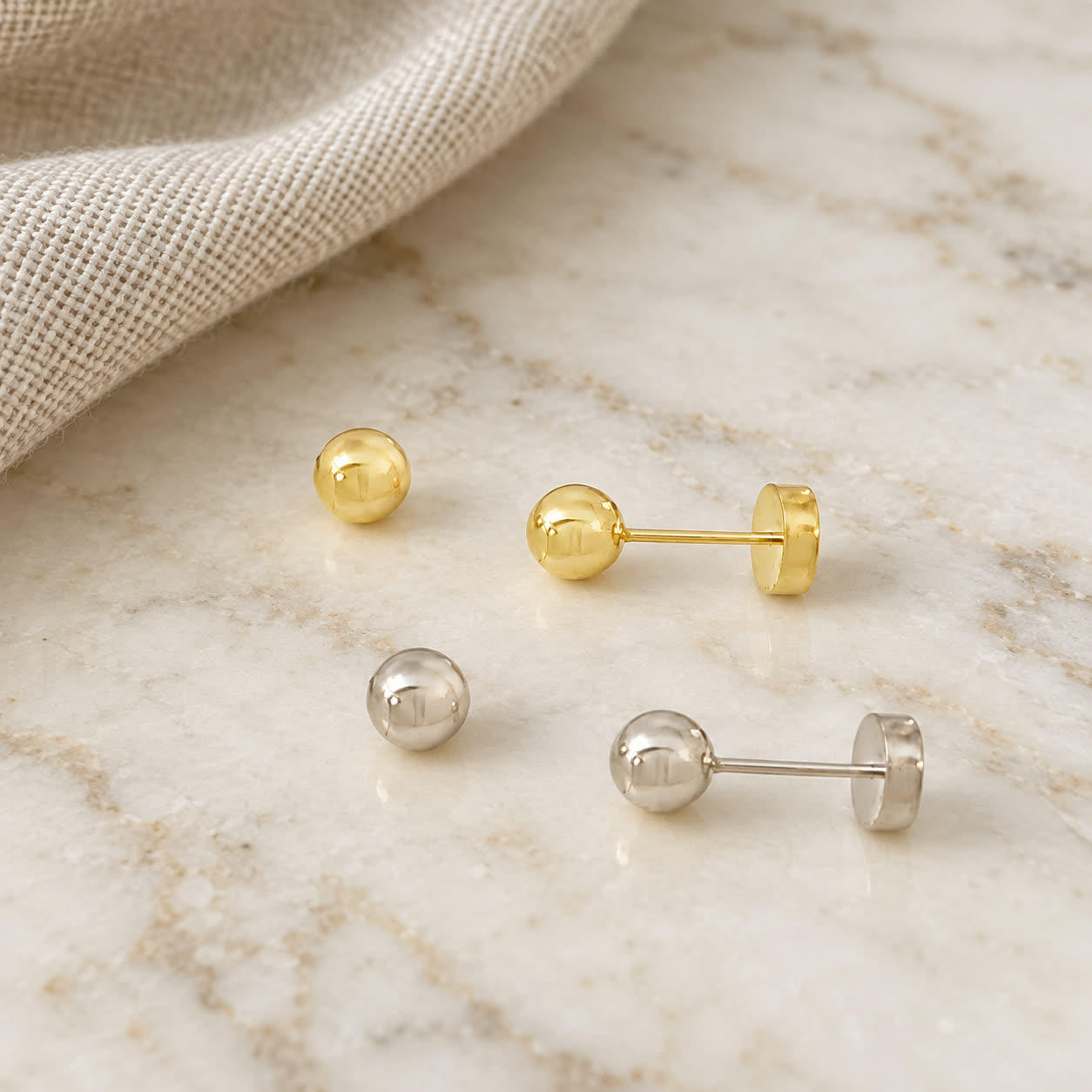 Aro Abridor Bolita 4mm · guagua en Oro 18k amarillo