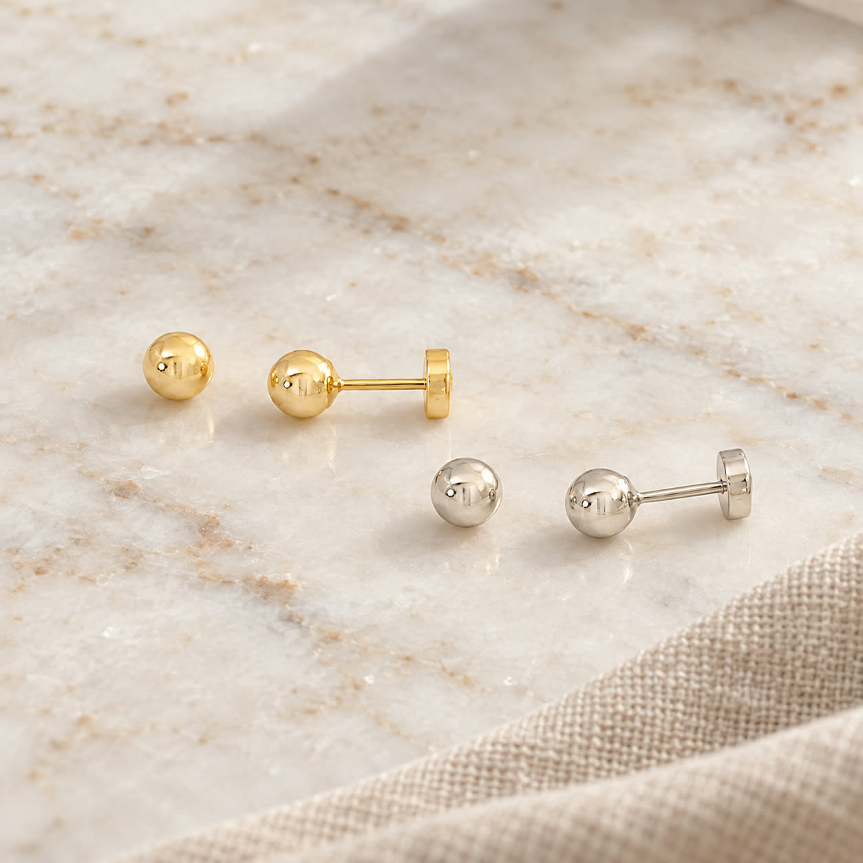 Aro Abridor Bolita 4,5mm · guagua en Oro 18k amarillo